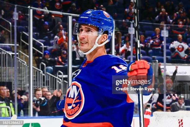 Pierre Engvall of the New York Islanders celebrates after scoring a goal against the Columbus Blue Jackets during the first period at UBS Arena on...