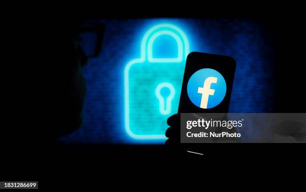 Facebook Encryption The Facebook logo is seen on a mobile device in this illustration ...