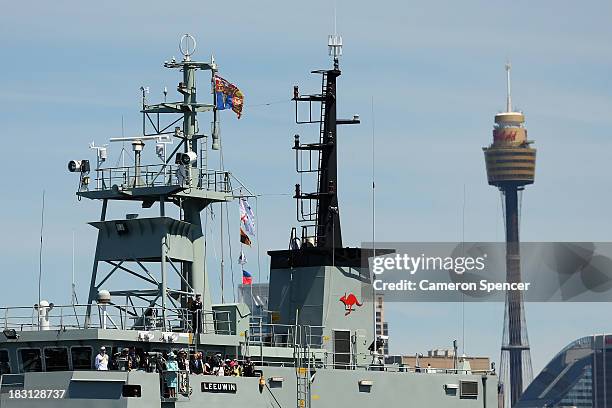 Prince Harry and Australian Governor-General Quentin Bryce onboard the HMAS Leeuwin observe ships during the 2013 International Fleet Review on...