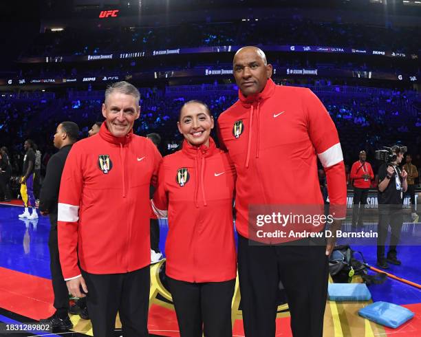 Referee Scott Foster Referee Ashley Moyer-Gleich & Referee Kevin Cutler poses for a photo before the game during the semifinals of the In-Season...