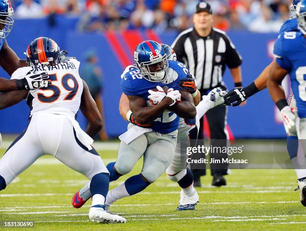 David Wilson of the New York Giants in action against the Denver Broncos on September 15, 2013 at MetLife Stadium in East Rutherford, New Jersey. The...