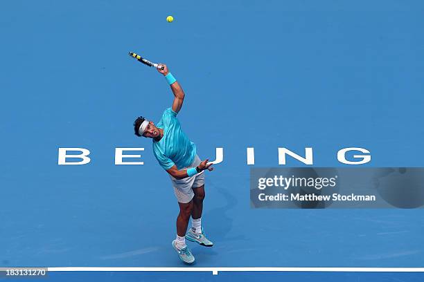 Rafael Nadal of Spain serves to Tomas Berdych of Czech Republic during the semifinals of the 2013 China Open at the National Tennis Center on October...