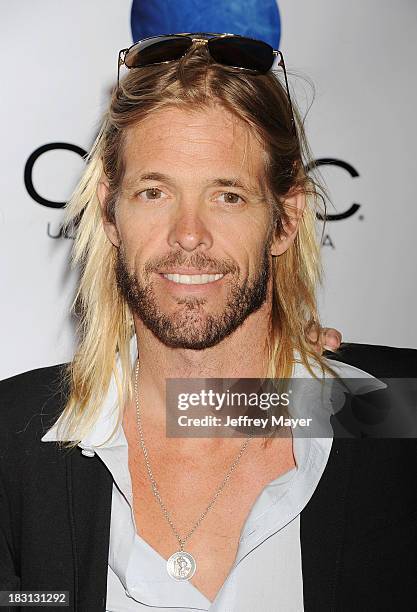 Musician Taylor Hawkins arrives at the "CBGB" Special Screening at ArcLight Cinemas on October 1, 2013 in Hollywood, California.