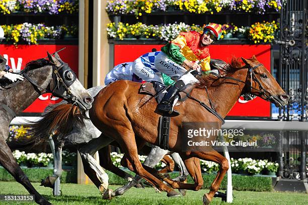 Dwayne Dunn riding Happy Trails reacts after winning Turnbull Stakes during Melbourne Racing at Flemington Racecourse on October 5, 2013 in...