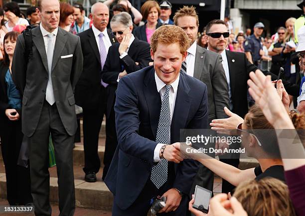 Prince Harrygreets members of the public at Campbell Cove on October 5, 2013 in Sydney, Australia. Over 50 ships participate in the International...