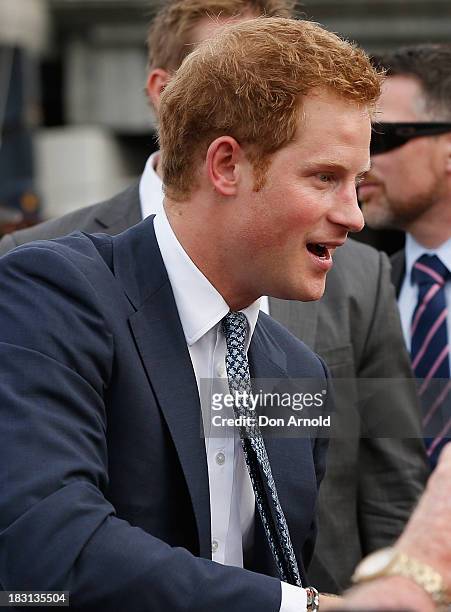 Prince Harry greets fans at Campbell Cove on October 5, 2013 in Sydney, Australia. Over 50 ships participate in the International Fleet Review at...