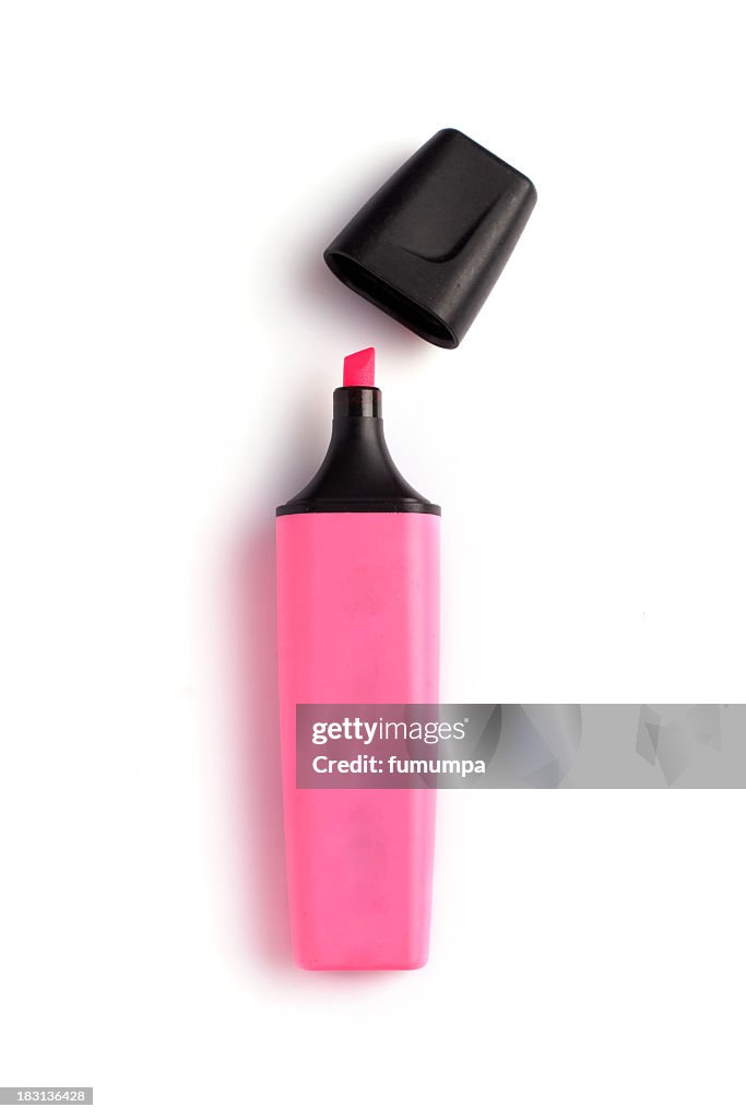 Pink highlighter with the cap off on white background