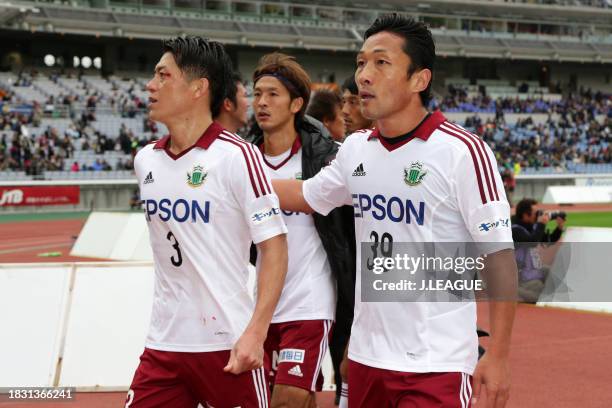 Hayuma Tanaka and Yoshiro Abe of Matsumoto Yamaga react after the scoreless draw in during the J.League J1 second stage match between Yokohama...