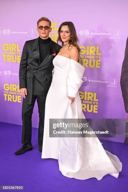 Matthias Schweighöfer and Bella Dayne attend the Munich premiere of "Girl You Know It's True" at Mathaeser Filmpalast on December 04, 2023 in Munich,...