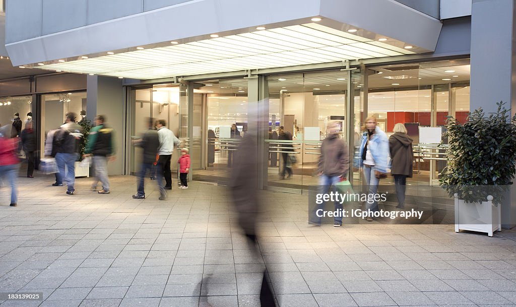 Shopping Mall Entrance with People Walking