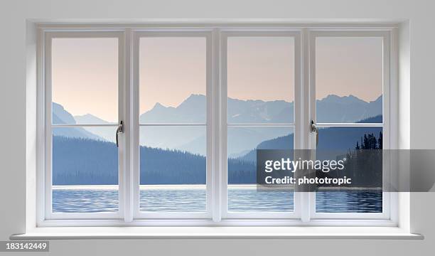 white window with lake view - windowframe stockfoto's en -beelden