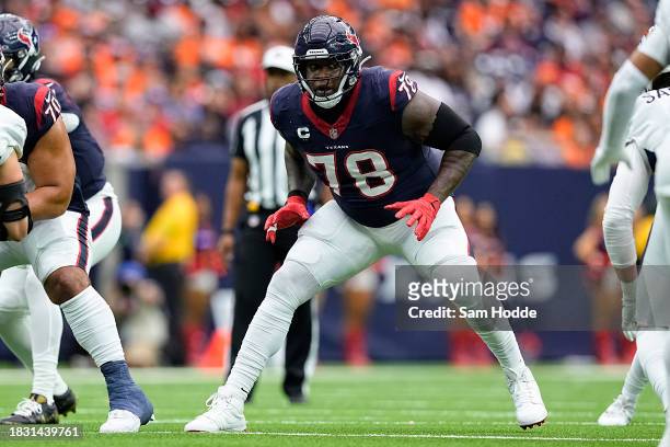 Laremy Tunsil of the Houston Texans defends during the first half against the Denver Broncos at NRG Stadium on December 03, 2023 in Houston, Texas.