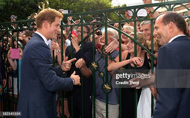 Prince Harry greets well wishers at Kirribilli House on October 5, 2013 in Sydney, Australia. Over 50 ships participate in the International Fleet...