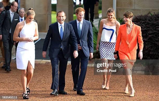 Prince Harry , Australian Prime Minister Tony Abbott his wife Margie and daughters Bridget and Francis visit Kirribilli House on October 5, 2013 in...