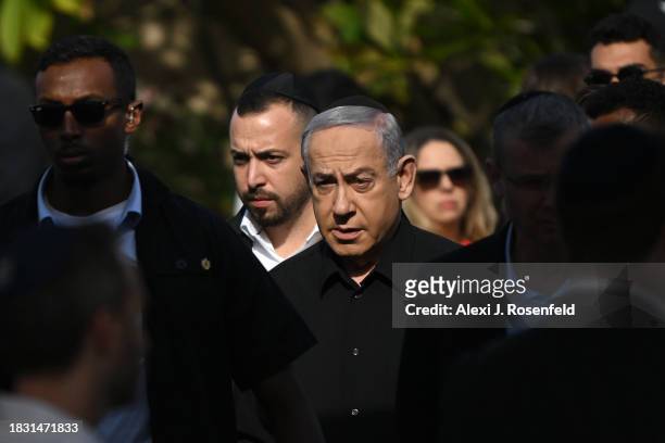 Israeli Prime Minister Benjamin Netanyahu attends the funeral for First Sergeant Major Gal Meir Eisenkot, 25 years old, at the Herzliya cemetery on...