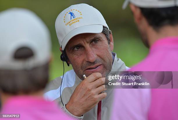 European team captain Jose Maria Olazabal ponders during the third day's morning foursomes at the Seve Trophy at Golf de Saint-Nom-la-Breteche on...