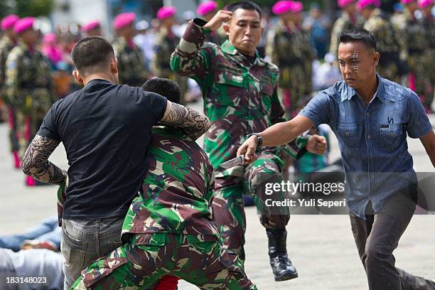 Indonesia army soldiers demonstrate hand-to-hand combat during the 68th anniversary commemoration of the Indonesian Military or TNI on October 5,...