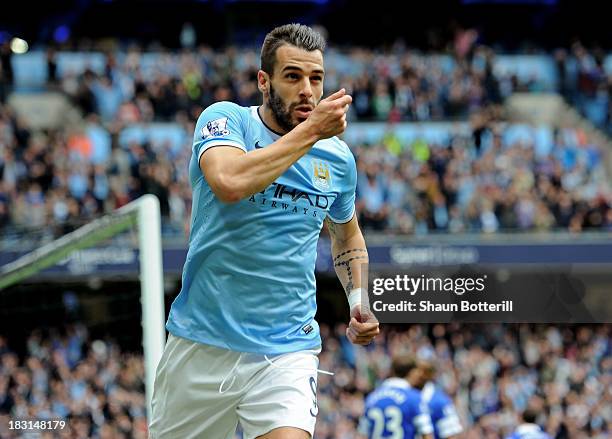 Alvaro Negredo of Manchester City celebrates after scoring to level the scores at 1-1 during the Barclays Premier League match between Manchester...