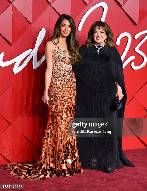 Amal Clooney and Baria Alumuddin attend The Fashion Awards 2023 Presented by Pandora at the Royal Albert Hall on December 04, 2023 in London, England.