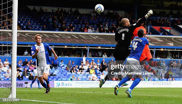 Neil Danns of Bolton Wanderers beats Darren Randolph of Birmingham City with a header to score a goal during the Sky Bet Championship match between...