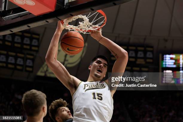 Zach Edey of the Purdue Boilermakers dunks the ball during the second half of their game against the Iowa Hawkeyes on December 04, 2023 in West...