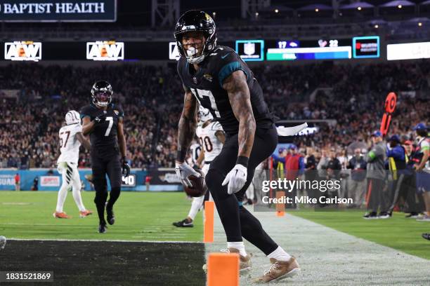 Evan Engram of the Jacksonville Jaguars celebrates a touchdown reception against the Cincinnati Bengals during the second quarter at EverBank Stadium...