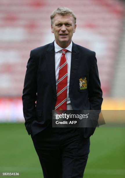 Manchester United's Scottish manager David Moyes walks off the pitch prior to the English Premier League football match between Sunderland and...