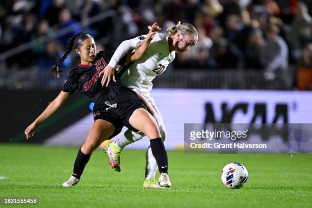 Joelle Jung of the Stanford Cardinal battles Heather Gilchrist of the Florida St. Seminoles for the ball during the 2023 Division I Women's Soccer...