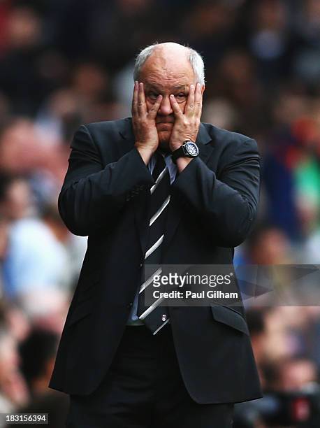 Fulham manager Martin Jol looks on during the Barclays Premier League match between Fulham and Stoke City at Craven Cottage on October 5, 2013 in...