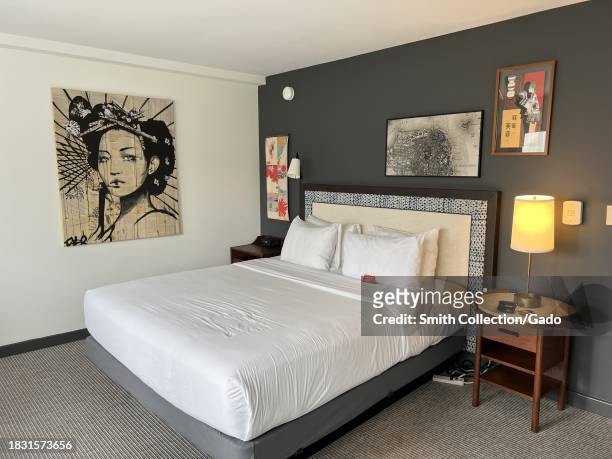 Modern hotel room with art decor, featuring a comfortable bed and contemporary furnishings, Hotel Kabuki, Japantown, San Francisco, California,...