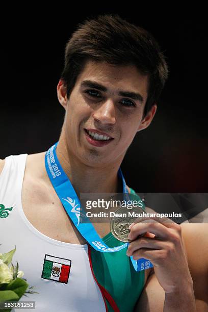 Daniel Corral Barron of Mexico poses after winning the silver medal in the Pommel Horse Final on Day Six of the Artistic Gymnastics World...