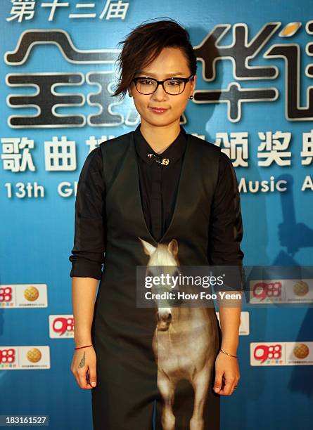 Bibi Chou of China poses during the red capet prior to the start of the 13th Global Chinese Music Awards at Putra Stadium on October 5, 2013 in Kuala...