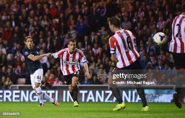 Adnan Januzaj of Manchester United scores his team's second goal during the Barclays Premier League match between Sunderland and Manchester United at...