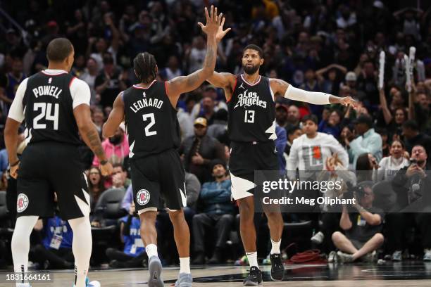 Paul George of the LA Clippers reacts to his shot in the end of the fourth quarter against the Golden State Warriors with Kawhi Leonard at Crypto.com...