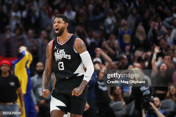 Paul George of the LA Clippers reacts to his shot in the end of the fourth quarter against the Golden State Warriors at Crypto.com Arena on December...