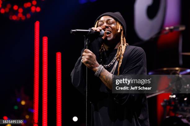 Lil Wayne performs onstage during iHeartRadio 103.5 KISS FM's Jingle Ball 2023 on December 04, 2023 in Chicago, Illinois.