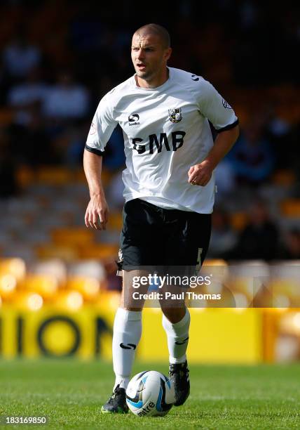 Carl Dickinson of Port Vale in action during the Sky Bet League One match between Port Vale and Bristol City at Vale Park on October 05, 2013 in...