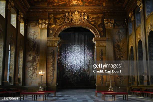An art installation by Paul Cocksedge entitled 'Coalescence' is displayed in the Painted Hall of the Old Royal Naval College on December 8, 2023 in...