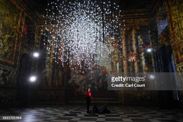 An art installation by Paul Cocksedge entitled 'Coalescence' is displayed in the Painted Hall of the Old Royal Naval College on December 8, 2023 in...