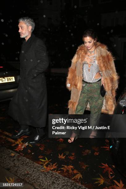 Taika Waititi and Rita Ora seen attending The Fashion Awards 2023 Charlotte Tilbury afterparty on December 04, 2023 in London, England.