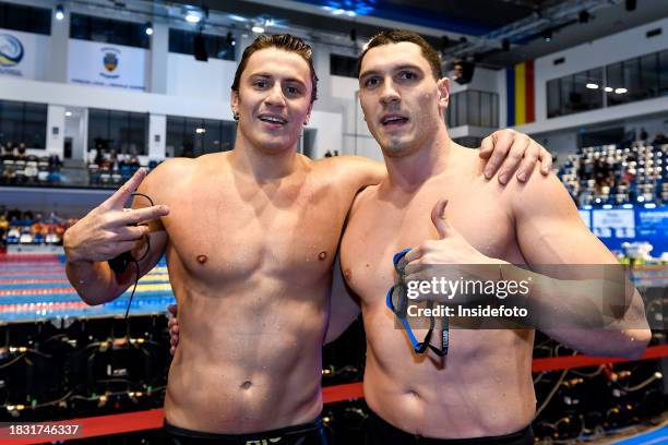 Nicolo Martinenghi of Italy, silver, and Simone Cerasuolo of Italy react after competing in the 100m Breaststroke Men Final during the European Short...