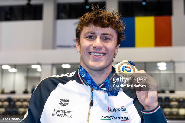 Nicolo Martinenghi of Italy shows the silver medal after competing in the 100m Breaststroke Men Final during the European Short Course Swimming...