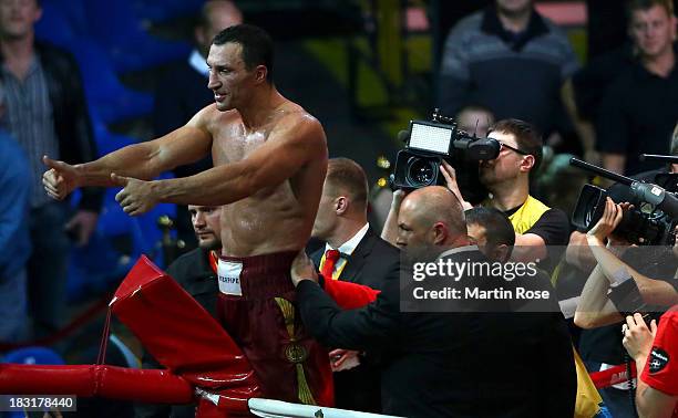 Wladimir Klitschko of Ukraine celebrates after winning the WBO, WBA, IBF and IBO heavy weight title fight between Wladimir Klitschko and Alexander...