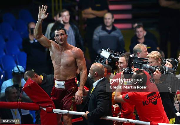 Wladimir Klitschko of Ukraine celebrates after winning the WBO, WBA, IBF and IBO heavy weight title fight between Wladimir Klitschko and Alexander...