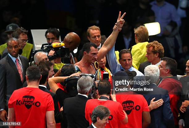 Wladimir Klitschko of Ukraine celebrates after winning the WBO, WBA, IBF and IBO heavy weight title fight between Wladimir Klitschko and Alexander...