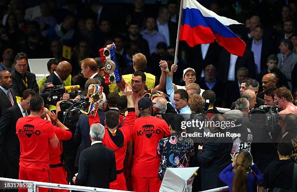 Wladimir Klitschko of Ukraine celebrates after winning the WBO, WBA, IBF and IBO heavy weight title fight between Wladimir Klitschko and Alexander...