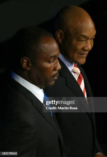 Lennox Lewis and George Foreman are pictured before the WBO, WBA, IBF and IBO heavy weight title fight between Wladimir Klitschko and Alexander...