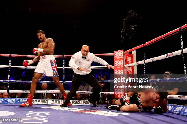 Anthony Joshua knocks out Emanuele Leo during their Heavyweight bout at O2 Arena on October 5, 2013 in London, England.