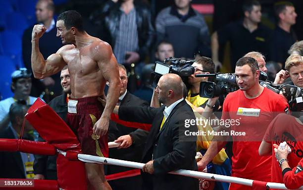 Wladimir Klitschko of Ukraine celebrates after winning the WBO, WBA, IBF and IBO heavy weight title fight between Wladimir Klitschko and Alexander...