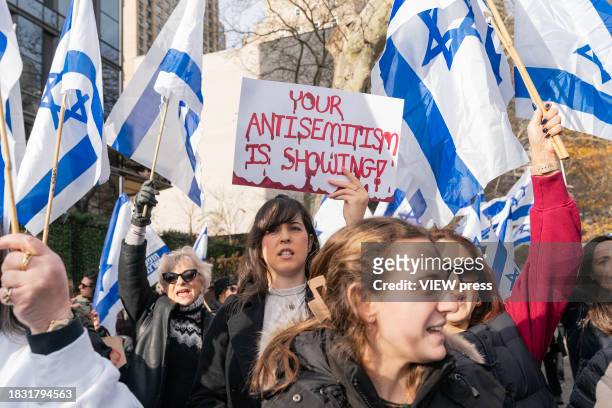 More than hundreds activists, mostly women, rally at Dag Hammarskjold Plaza on December 4, 2023 in New York in support of Israeli women sexually...